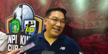 Syafliansyah saat memberi pengarahan dalam kegiatan olahraga masyarakat