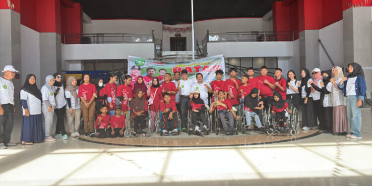 Dokumentasi peresmian ruang sekretariat NPCI Kukar setelah direnovasi, mendukung manajemen dan pembinaan atlet disabilitas.